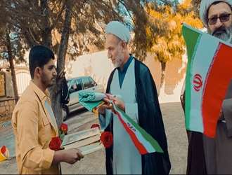  آیین اهتزاز پرچم مقدس جمهوری اسلامی ایران در دانشکده علوم قرآنی ملایر
